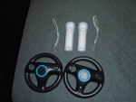 new 2 wii controllers /2 steering wheels