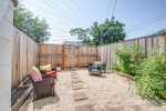 Large 4BR/2.5BA rowhouse w/ 2 off-street parking spaces & fenced patio