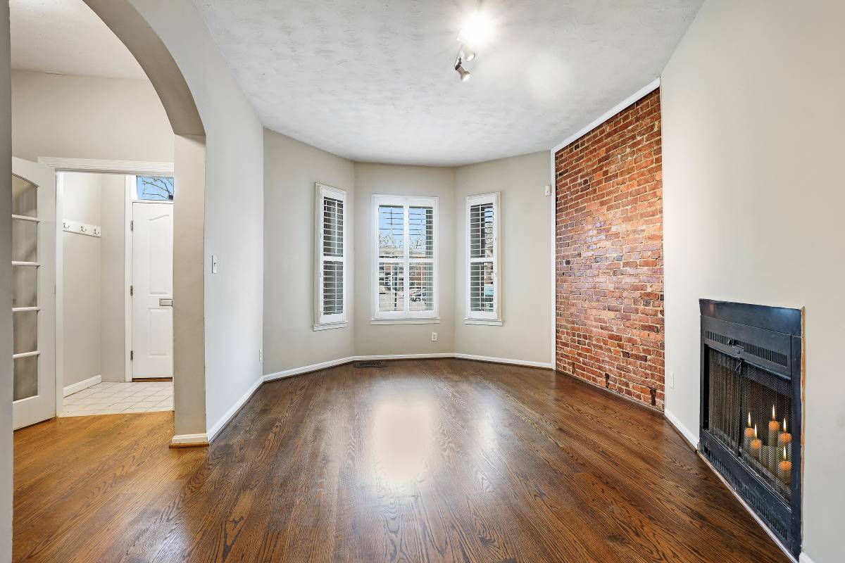Large 4BR/2.5BA rowhouse w/ 2 off-street parking spaces & fenced patio