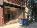 Live - work, renovated duplex storefront with rolling gate