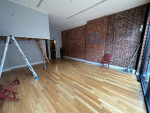 Live - work, renovated duplex storefront with rolling gate