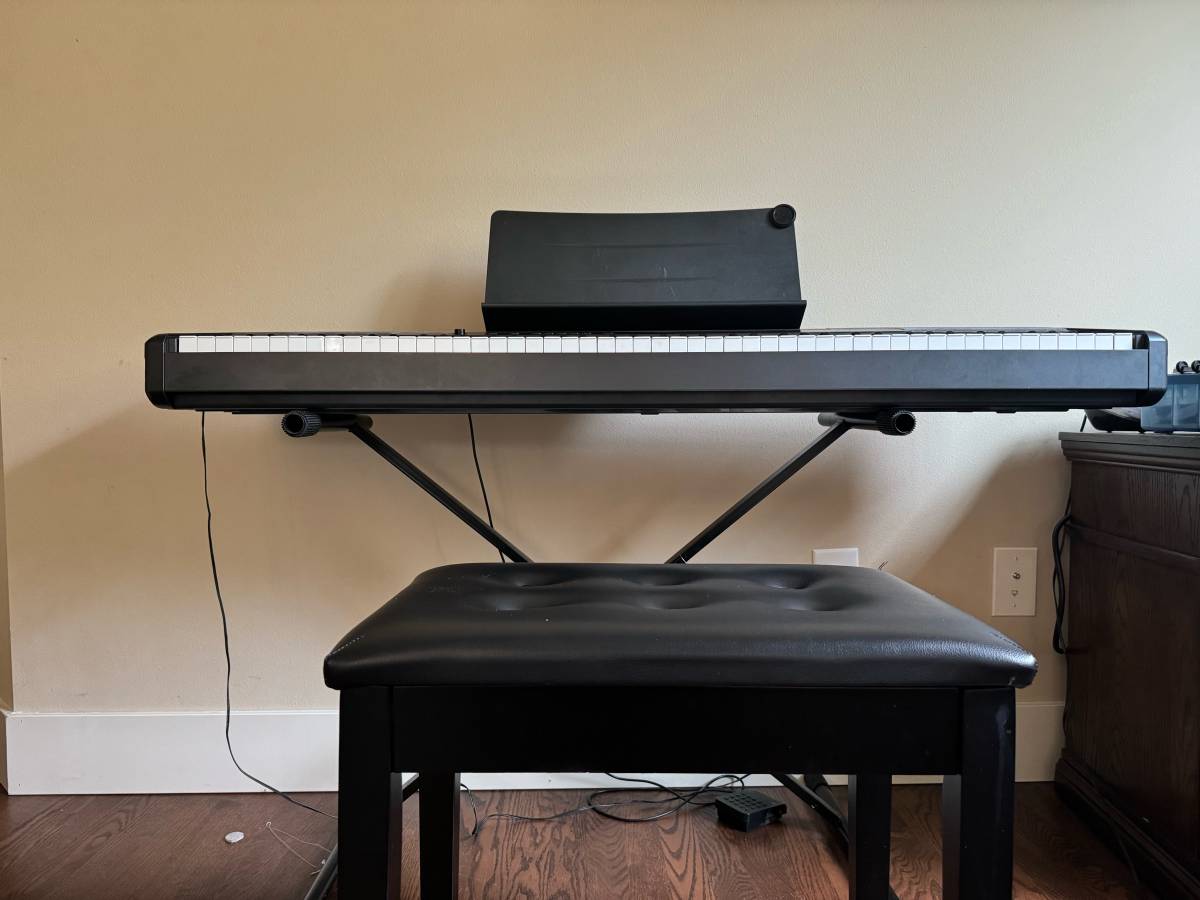 Casio 88 key piano with stool