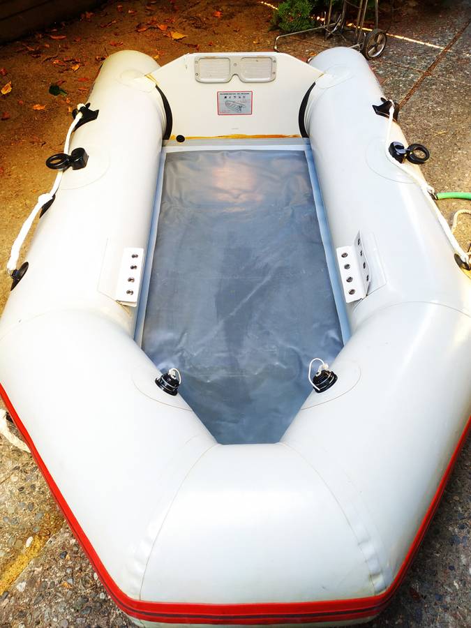 Nissan 8 feet inflatable with 2.5 HP outboard motor and all boating ac