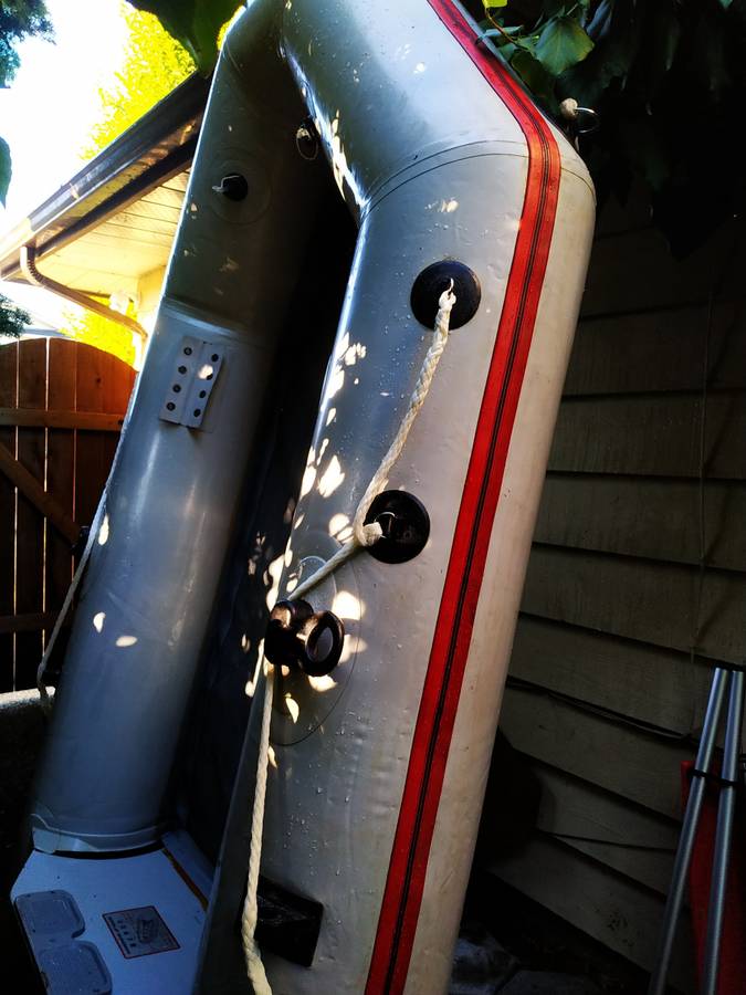 Nissan 8 feet inflatable with 2.5 HP outboard motor and all boating ac