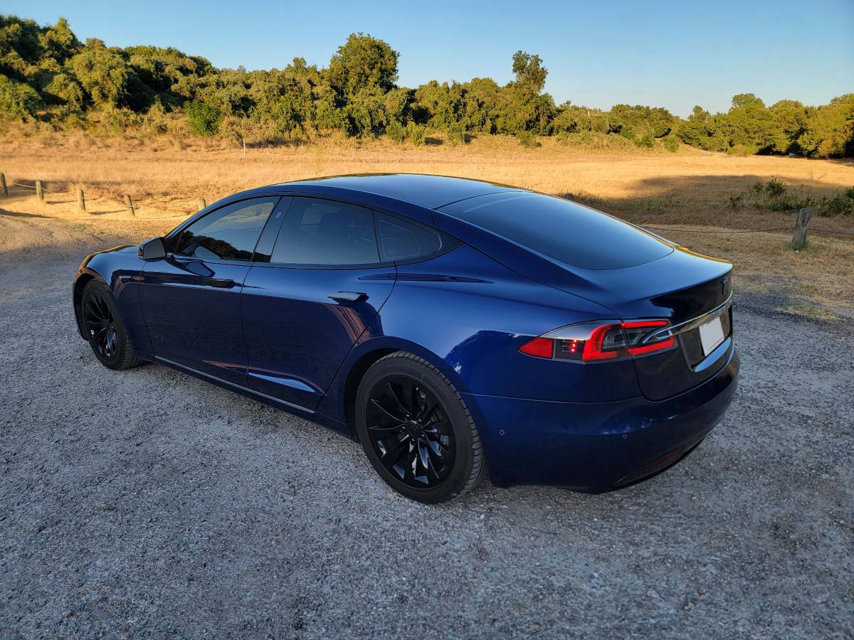 Tesla 118,000 mi